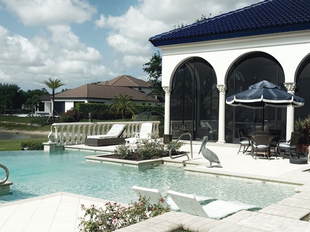 Pool and arched terrace of a Florida home