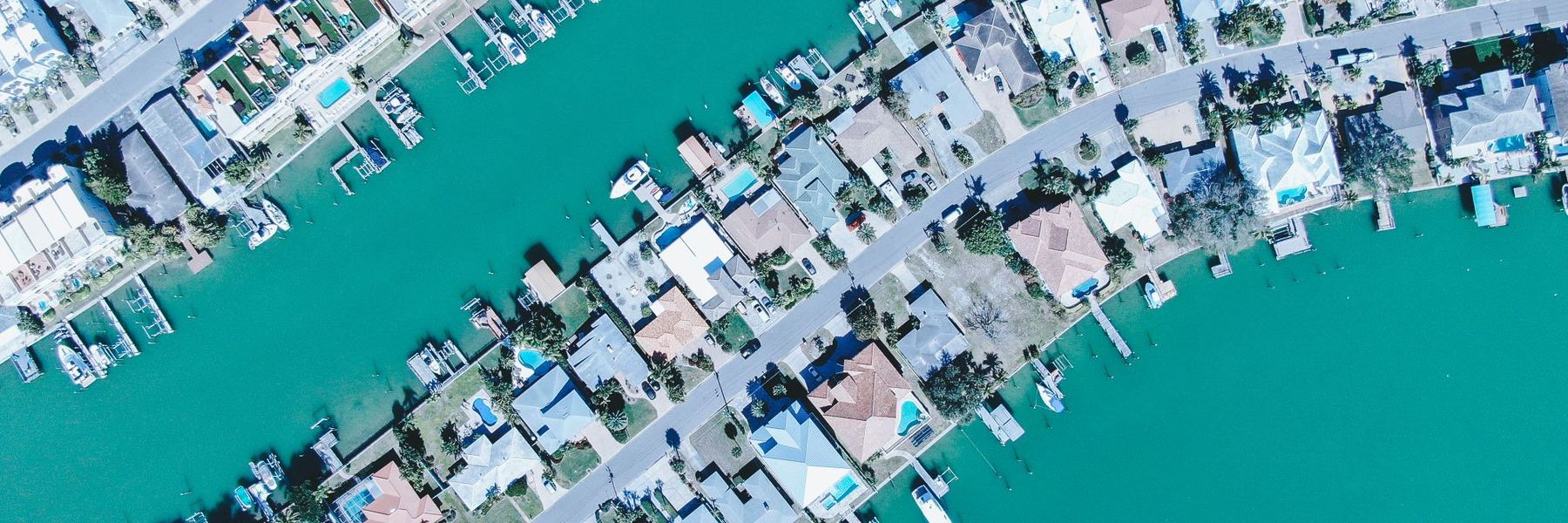 Aerial view of waterfront homes along canals